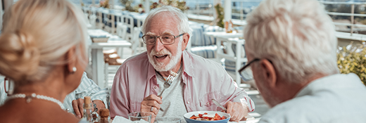 Image of four older people out at a restaurant